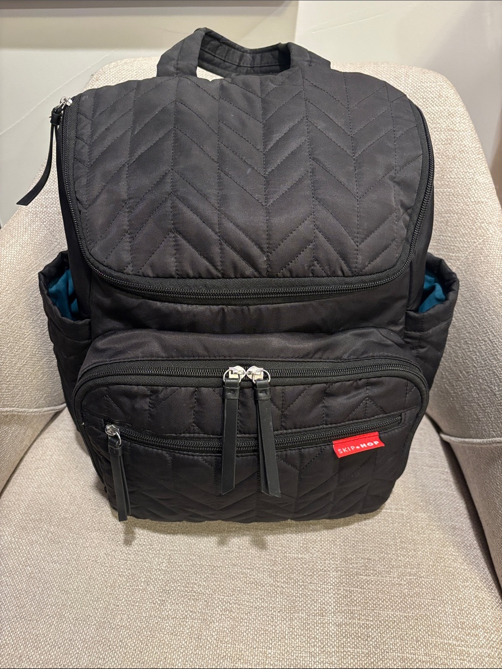 Skip Hop Black Quilted Backpack with Teal Interior Accents